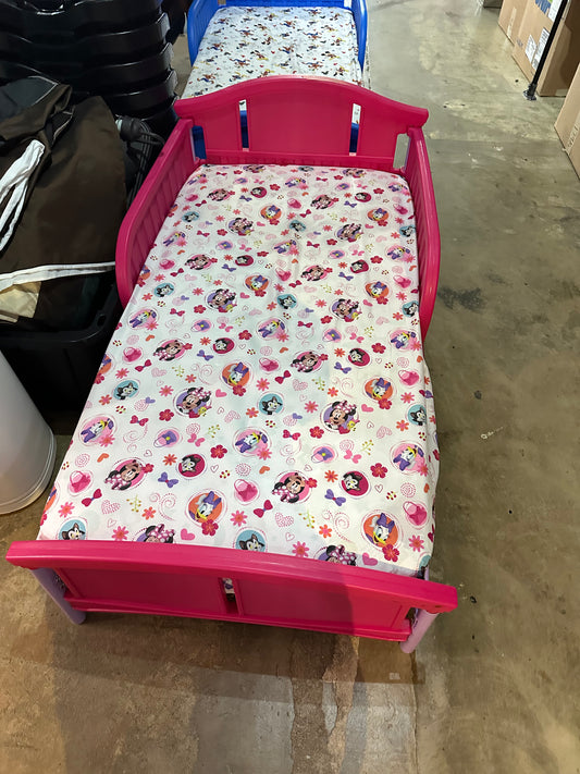 Pink toddler bed